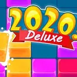 Světle modré pozadí se zářivými barevnými kostkami a textem 2020 Deluxe na červené stuze