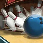Modrá bowlingová koule sráží několik kuželek na dráze