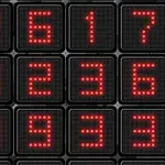 Černá mřížka s červenými LED číslicemi na displeji
