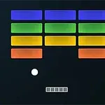 Barevné cihličky s míčkem a pálkou na černém pozadí s logem Atari v rohu