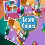 Usmívající se dítě v růžové čepici drží obrázek, obklopené barevnými prvky a kreslicí tabulí, s nápisem Learn Colors