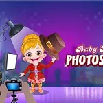 Dítě s kloboukem v ruce na focení ve studiu s fotoaparátem a osvětlením na fialovém pozadí