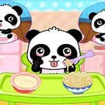 Roztomilá kreslená panda sedí u stolu s talířem těstovin a uvažuje o jídle, zatímco dvě myšlenkové bubliny ukazují různé potřeby či aktivity