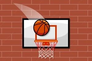Basketbalový míč letící do koše před cihlovou zdí