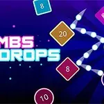 Barevné geometrické tvary s čísly a nápisem Bombs Drops na fialovém pozadí