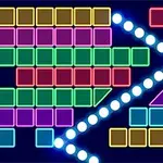Barevné bloky a svítící kuličky tvořící geometrický vzor na tmavém pozadí