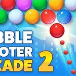 Barevné kuličky s nápisem Bubble Shooter Arcade 2 na modrém pozadí