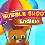 Medvídek drží barevné balónky s textem Bubble Shooter Endless na pozadí modré oblohy
