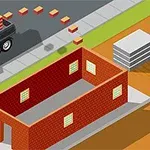 Stavební kamion vykládá cihly vedle rozestavěného cihlového domu na staveništi