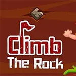 Muž s oranžovými vlasy a žlutým trikem leze po skále směrem k úchytu, vedle nápisu Climb The Rock