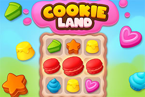 Barevné sušenky a sladkosti různých tvarů na hrací ploše s nápisem Cookie Land