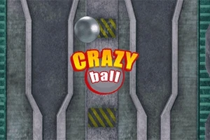 Kovová koule na industriálním pozadí s nápisem Crazy Ball ve žluté a červené barvě