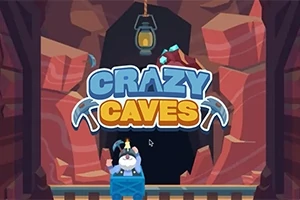 Nápis Crazy Caves s postavičkou horníka v modrém vozíku na kolejích u vchodu do jeskyně