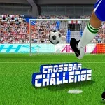 Fotbalista v modrých šortkách kope míč směrem k brance před zaplněnými tribunami s nápisem Crossbar Challenge