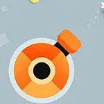 Oranžové dělo vystřelující stříbrnou hvězdu na šedém pozadí s žlutými a šedými čtverci