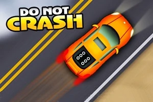 Oranžové auto na silnici s nápisem DO NOT CRASH