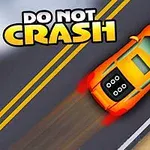 Oranžové auto na silnici s nápisem DO NOT CRASH