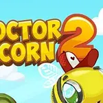 Barevný nápis Doctor Acorn 2 na modrém pozadí s kreslenou včelou a obláčky