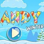 Barevný nápis „CANDY WINTER“ z cukrových tyčinek na zimním pozadí s horami a sněhem