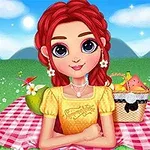 Dívka s červenými vlasy sedí na piknikové dece na louce, obklopená košíkem s ovocem a květinami