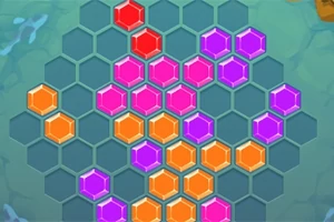 Barevné hexagonální dlaždice uspořádané na šestiúhelníkové herní desce