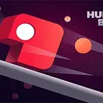 Červená kostka s bílým kruhem, pohybující se dynamicky na tmavém pozadí s nápisem HUNGRY BOX v pravém horním rohu