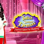 Žena v indickém tradičním oblečení stojí na růžovém pozadí s nápisem Indian Designer Dresses vedle ní