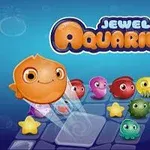 Barevné kreslené rybičky a hvězdice na herním plánu s nápisem Jewel Aquarium na modrém pozadí