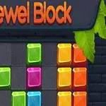 Barevné bloky různých tvarů a velikostí uspořádané na tmavém pozadí s nápisem Jewel Block nahoře