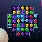 Barevné drahokamy uspořádané v geometrickém obrazci na vesmírném pozadí s planetami