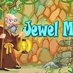 Starý muž s lucernou stojí před barevnou kamennou stěnou s nápisem Jewel Master