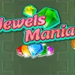 Nápis Jewels Mania s různobarevnými drahokamy na zeleném pozadí