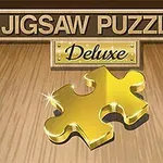 Zlatý dílek puzzle na dřevěném podkladu s nápisem Jigsaw Puzzle Deluxe