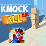 Barevní roboti jsou sráženi míčkem na ploše vedle stohů krabic, s textem Knock Em All nahoře