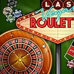 Kasinová ruleta s barevným kolem a žetony na zeleném plátně s nápisem Las Vegas Roulette