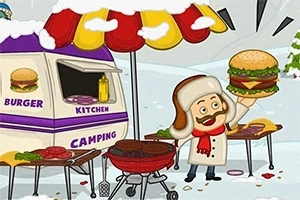 Muž v zimním oblečení drží velký hamburger vedle přívěsu s nápisem Burger Kitchen a grilem na sněhu