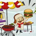 Muž v zimním oblečení drží velký hamburger vedle přívěsu s nápisem Burger Kitchen a grilem na sněhu