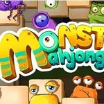 Barevný nápis Monster Mahjong obklopený různobarevnými kreslenými příšerami s různými výrazy