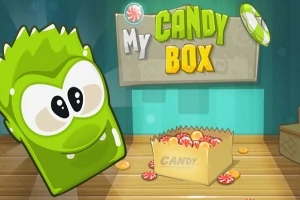 Zelený animovaný charakter s velkými očima vedle krabice plné sladkostí a nápisu My Candy Box
