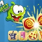 Zelená kreslená postavička s velkýma očima se směje vedle sladkostí a textu Om Nom Connect Classic