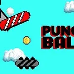 Pixlová grafika s textem PUNCH BALL, mincí, mraky a červenými a černými plošinami na modrém pozadí