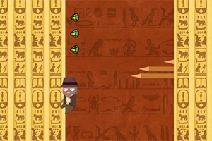 Kreslená postava s kloboukem leze po stěně zdobené hieroglyfy a vyhýbá se kolmým kopím