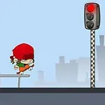 Dítě na skateboardu se pohybuje směrem ke stojícímu semaforu s červeným světlem na městském pozadí