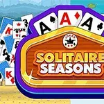Karty různých druhů a hodnot, včetně žolíka, s nápisem Solitaire Seasons uprostřed