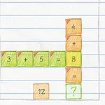 Barevné očíslované bloky s matematickými symboly plus a rovná se na čtverečkovaném papíře