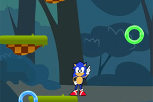 Sonic Jumper Modrá postava stojí na zelené plošině v lesním prostředí s plovoucími kroužky