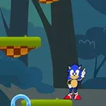 Sonic Jumper Modrá postava stojí na zelené plošině v lesním prostředí s plovoucími kroužky
