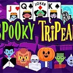Barevná ilustrace s nápisem Spooky TriPeaks obklopená kreslenými postavičkami strašidel, jako jsou upír, mumie a dýně, na fialovém pozadí s kartami