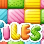 Barevné, vzorované bloky a bílý nápis TILES