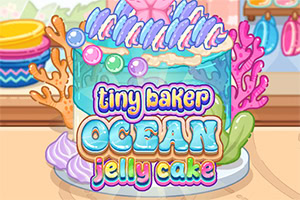 Barevný dort s mořskou tematikou, modrou polevou, mušlemi, korály a nápisem „tiny baker ocean jelly cake